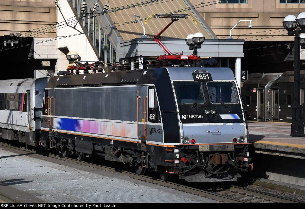 Commuter shoves out of the station